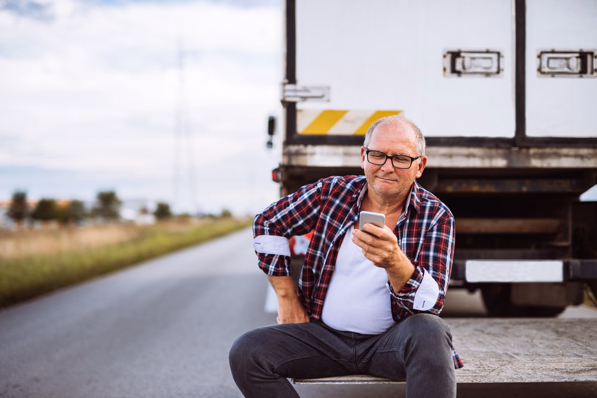 Truck driver on his phone