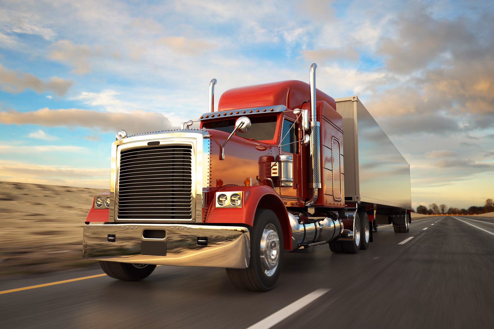 A red long haul truck on the road
