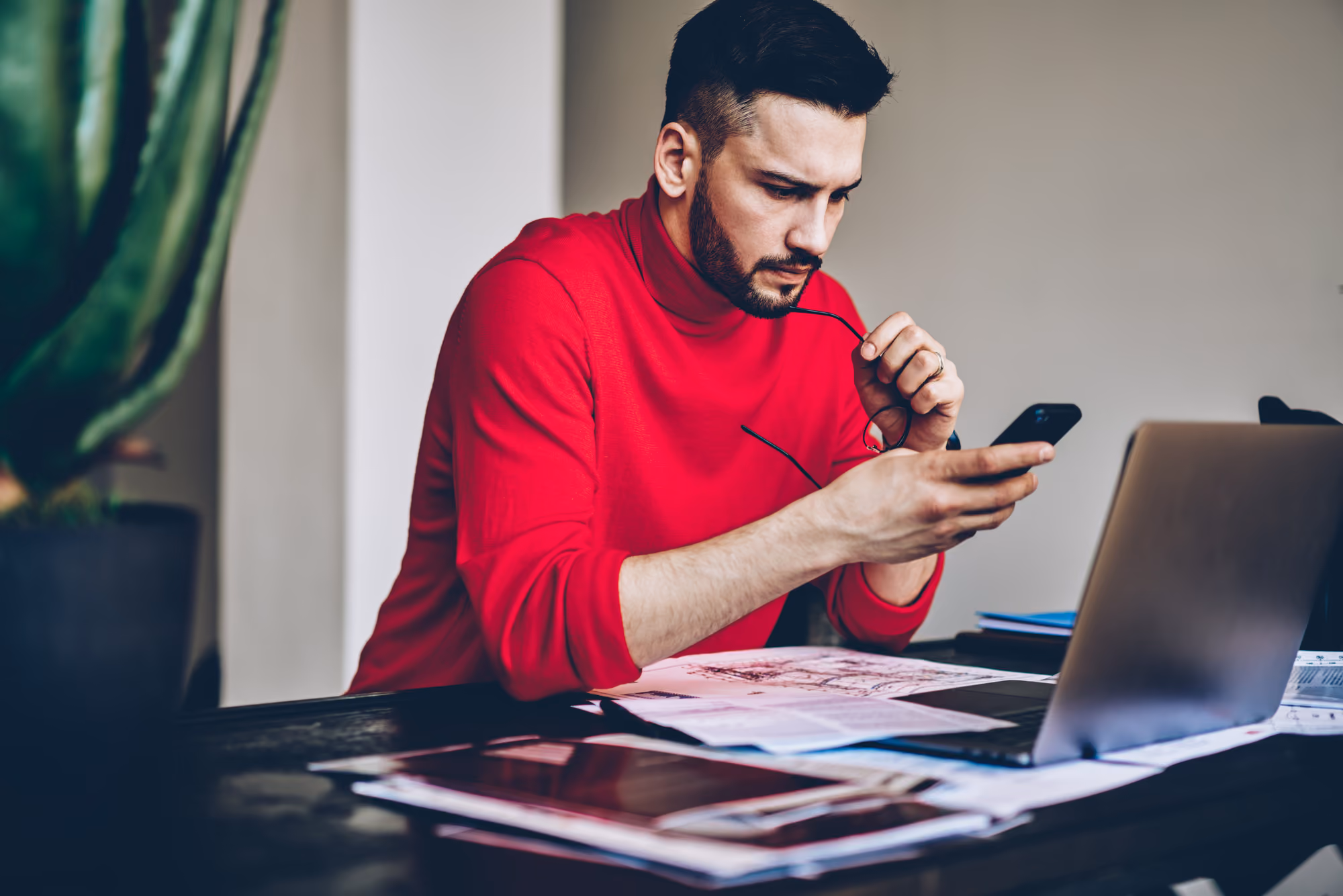 A young man working from home
