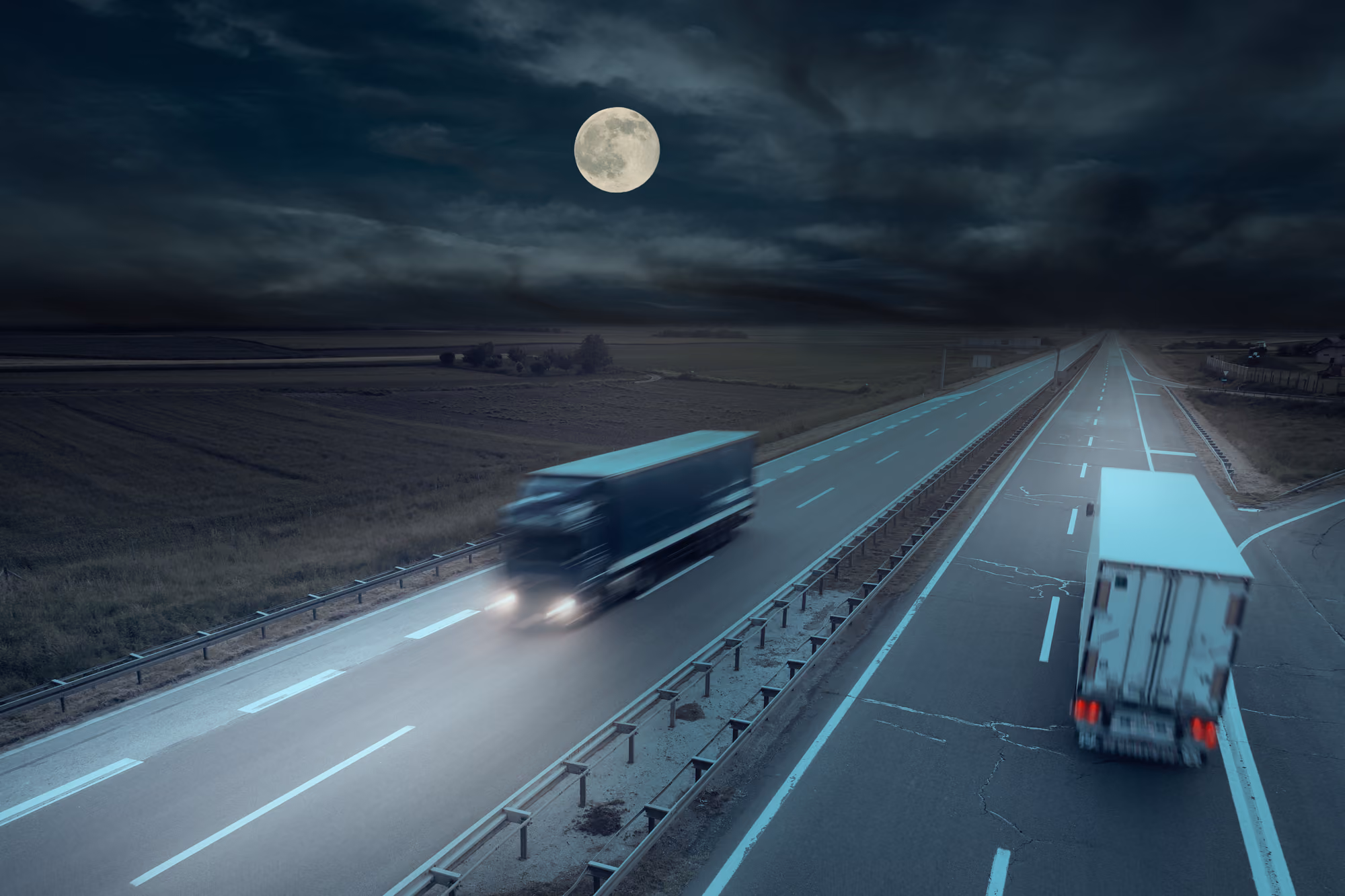 Trucks on the road at night