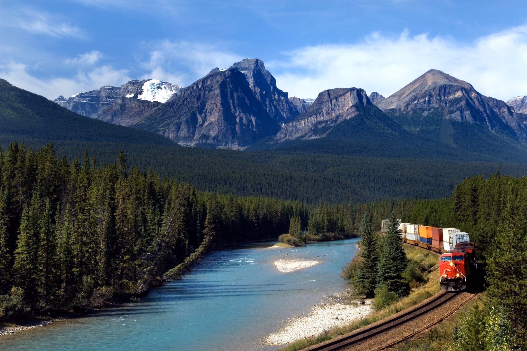 A train traveling over a scenic region