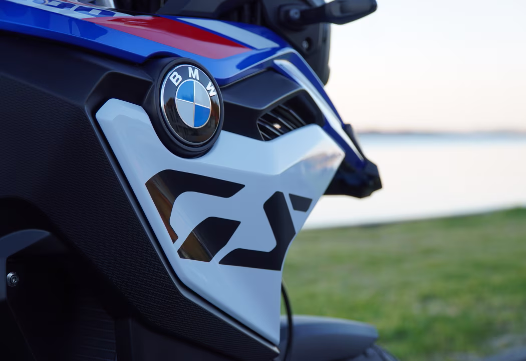 Close-up of the BMW roundel badge and GS side panel on the F800 GS