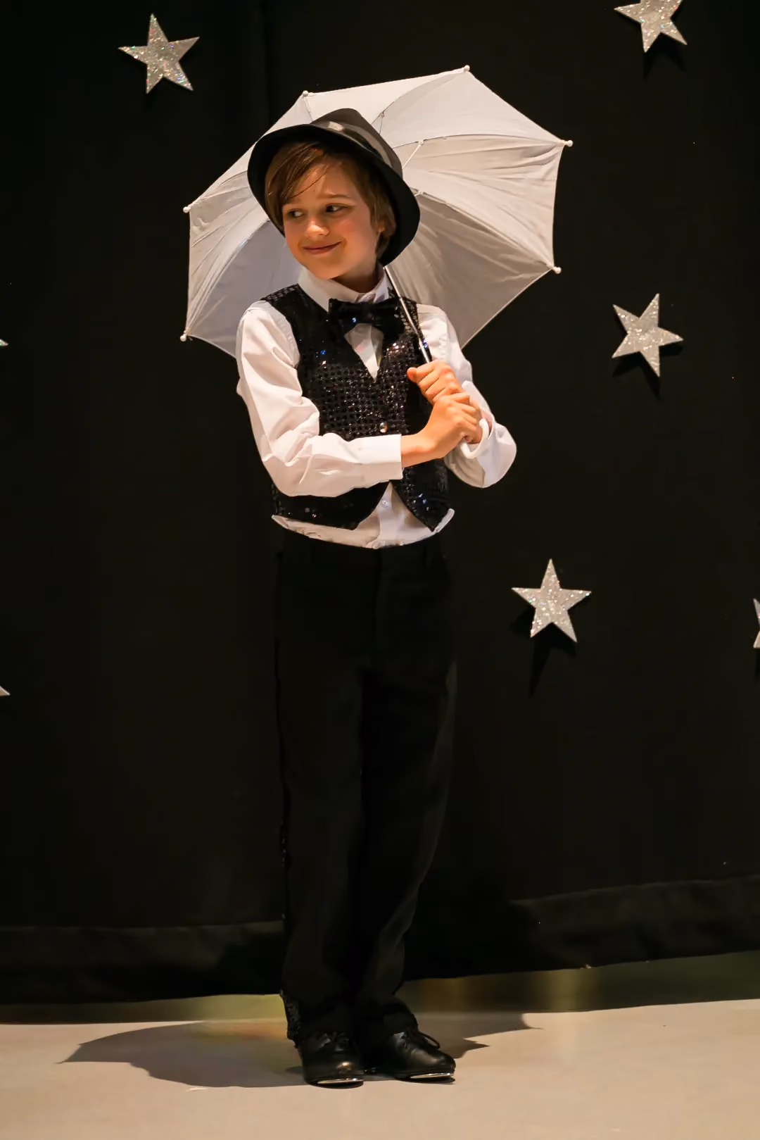 A boy enjoying a tap dance class at Stardust Dance Academy near Cambridge