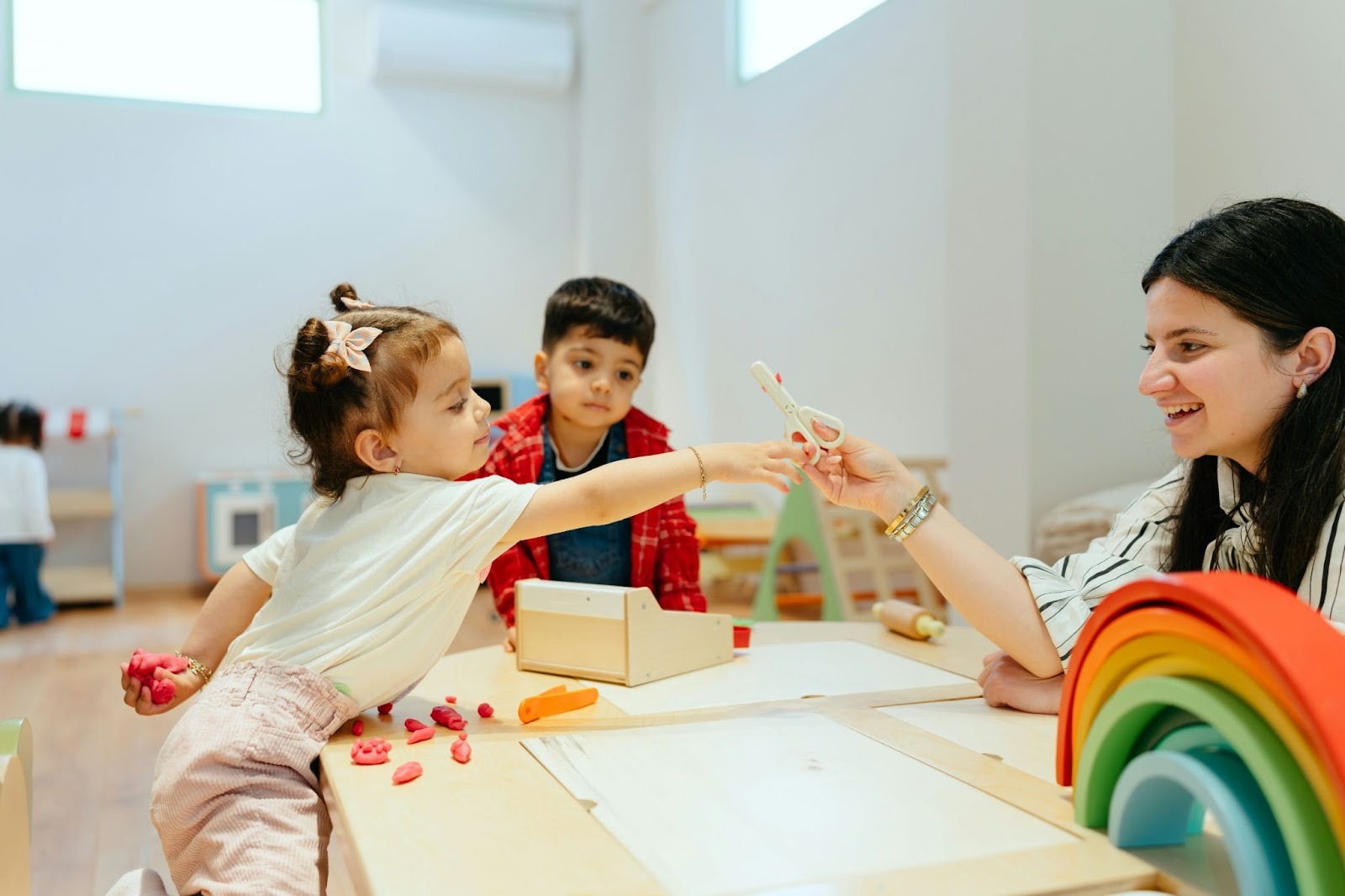 Teacher interacting with children