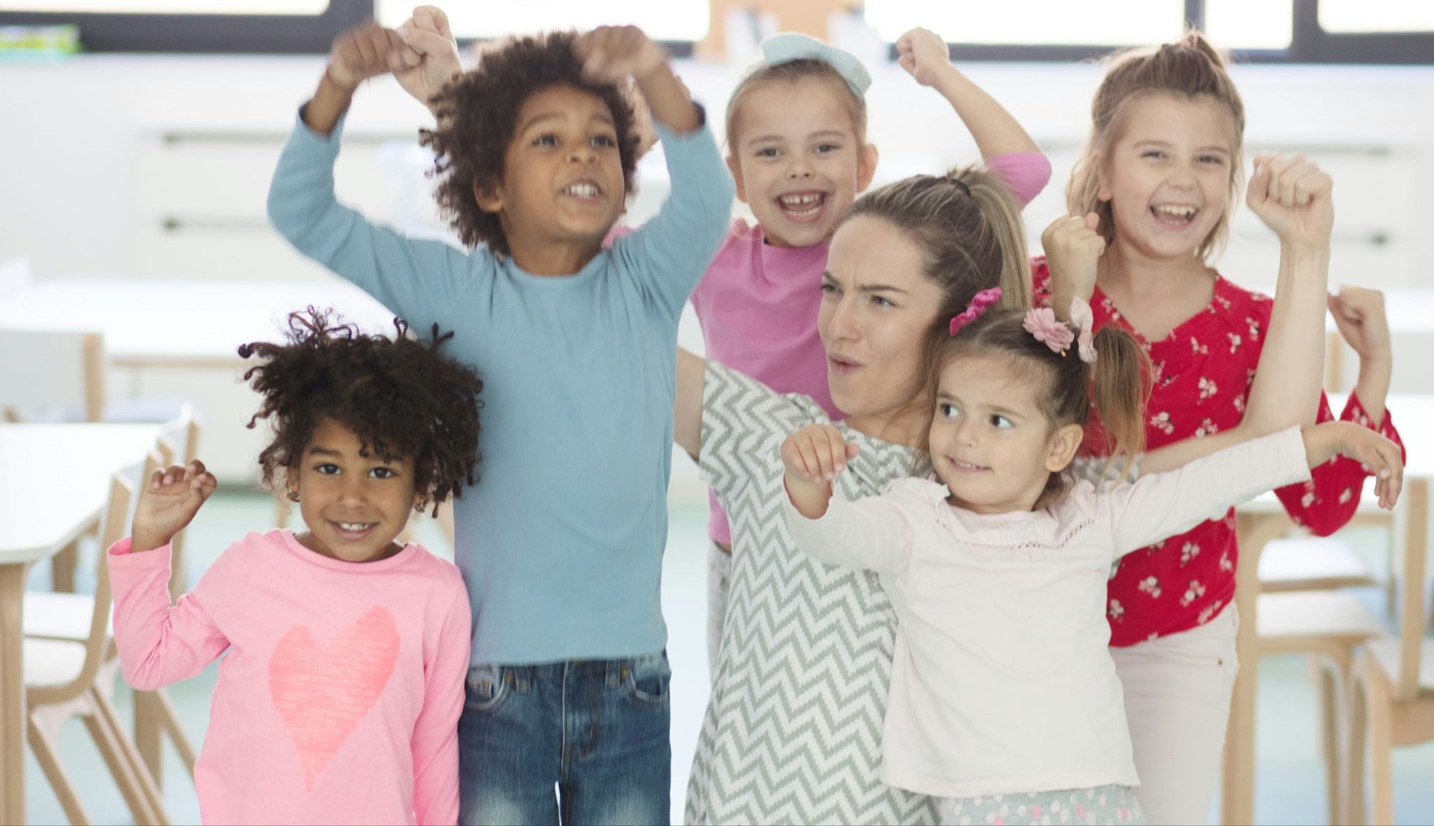 Kids of different ages with the teacher