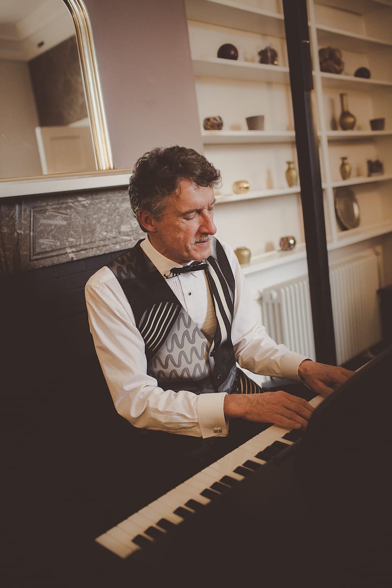 Pianist playing at a wedding reception.