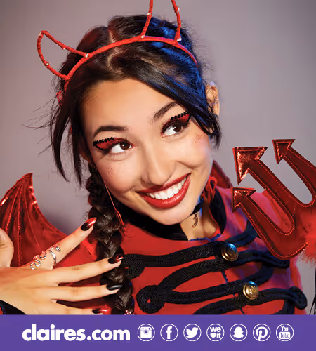 Teen girl wearing a Devil Costume