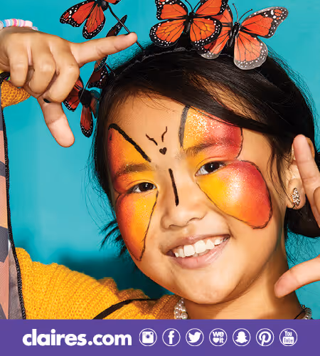 Young girl wearing a Monarch crown