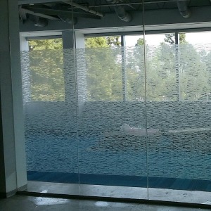 Office partition with decorative design for style and privacy.