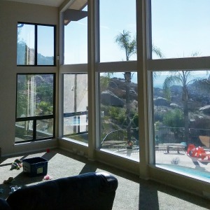 Image of reflective window film on residential building.