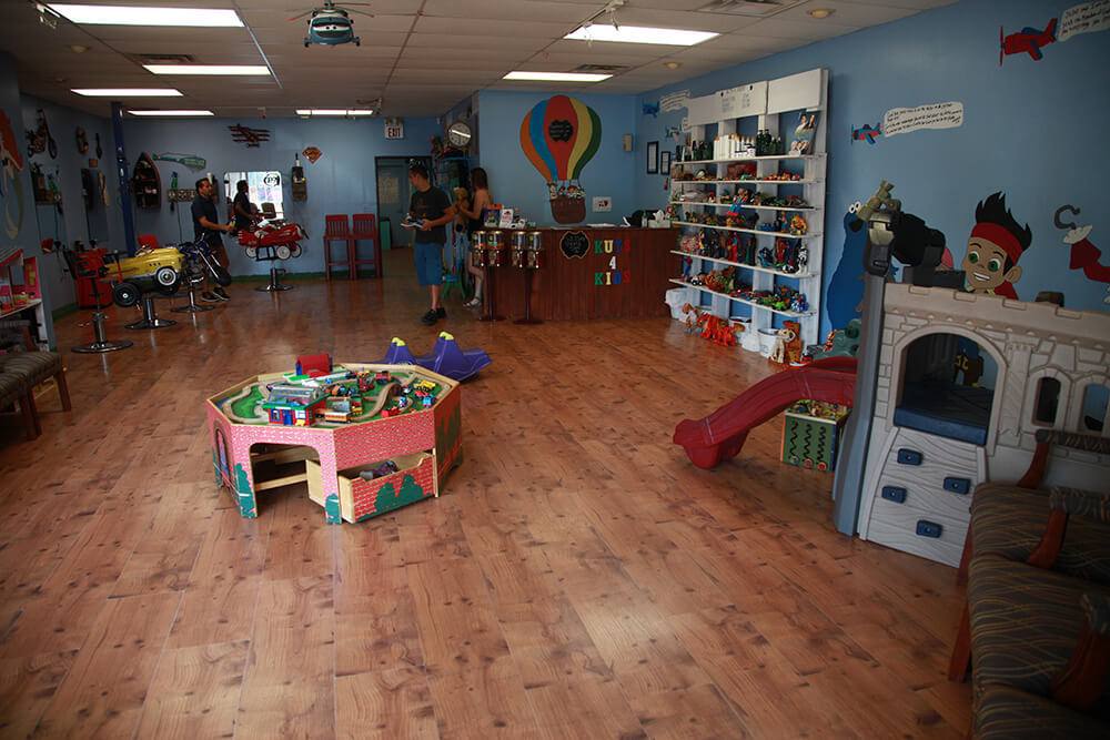 Unlike most hair shops for kids, it’s a rarity for kids to scream as they get their haircut at Kuts 4 Kids. Kids are happy. Kids sit in an airplane chair while getting a haircut and watch a cartoon. It’s only when it’s time to leave Kuts 4 Kids that you might hear a temper tantrum. (Photo: Marc Rains)