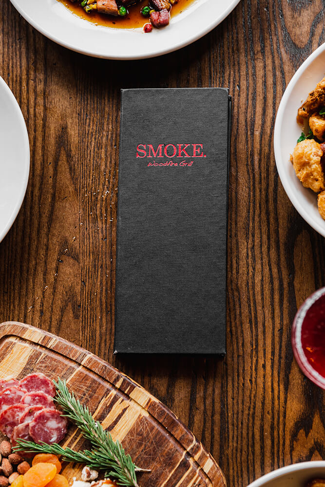 SMOKE. takes its name from the woodfire grill and the wood smoker used to make their bacon. That woody, smoky flavor kisses all the proteins during their time over the flame. (Photo: Sarah Eliza Roberts)