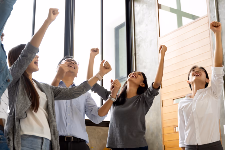engaged-happy-resilient-teams-celebrating