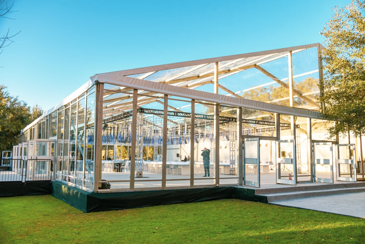 Large tented event structure lit at dusk