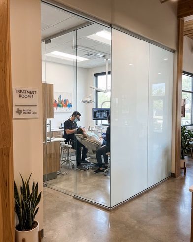 Austin dental treatment room with clear and frosted smart glass partitions