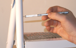 Photo of the PosiPen measuring post-cure powder coating thickness