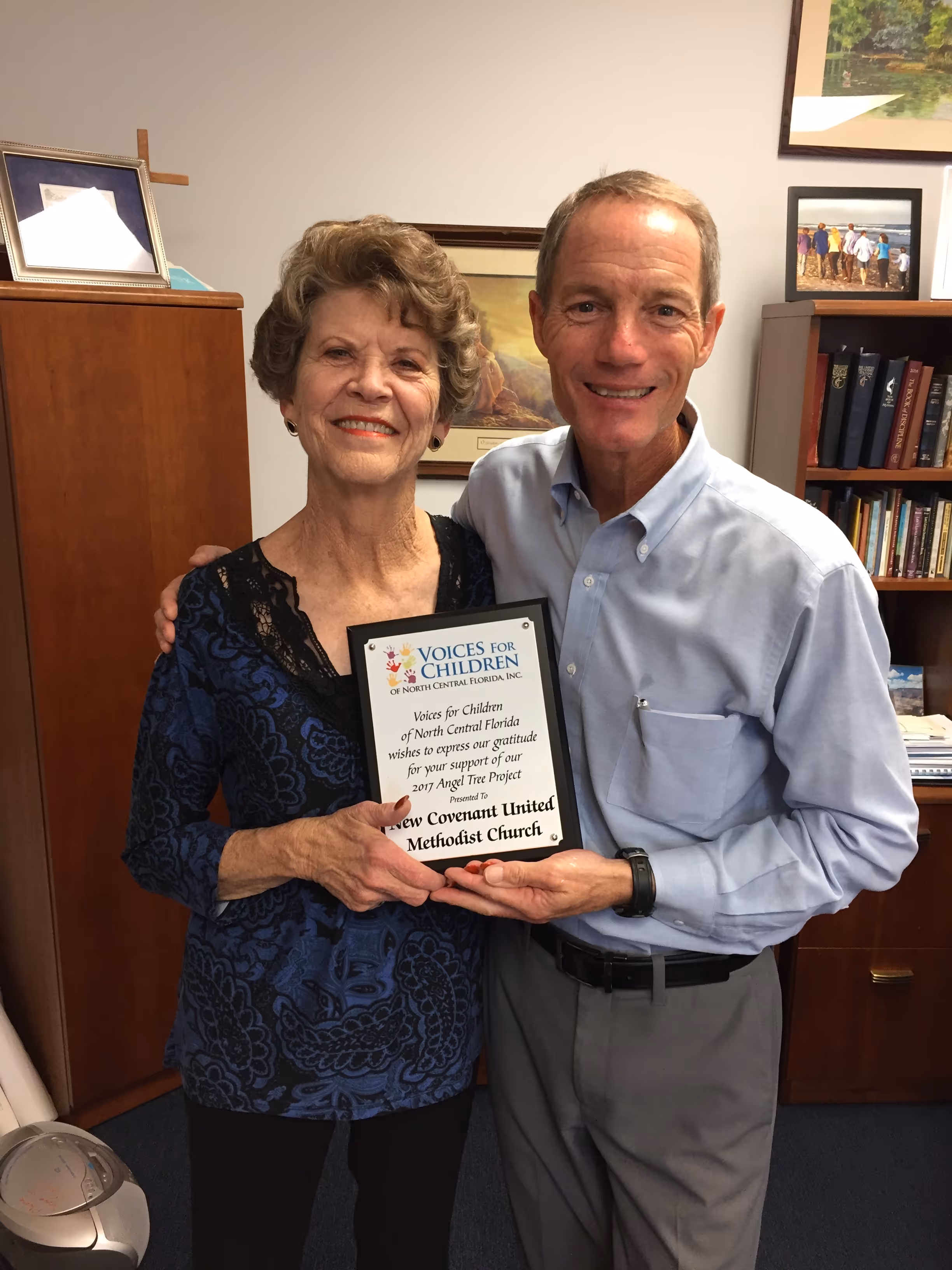 Wanda Vogler of Voices for Children and Reverend Harold Hendron of New Covenant United Methodist Church