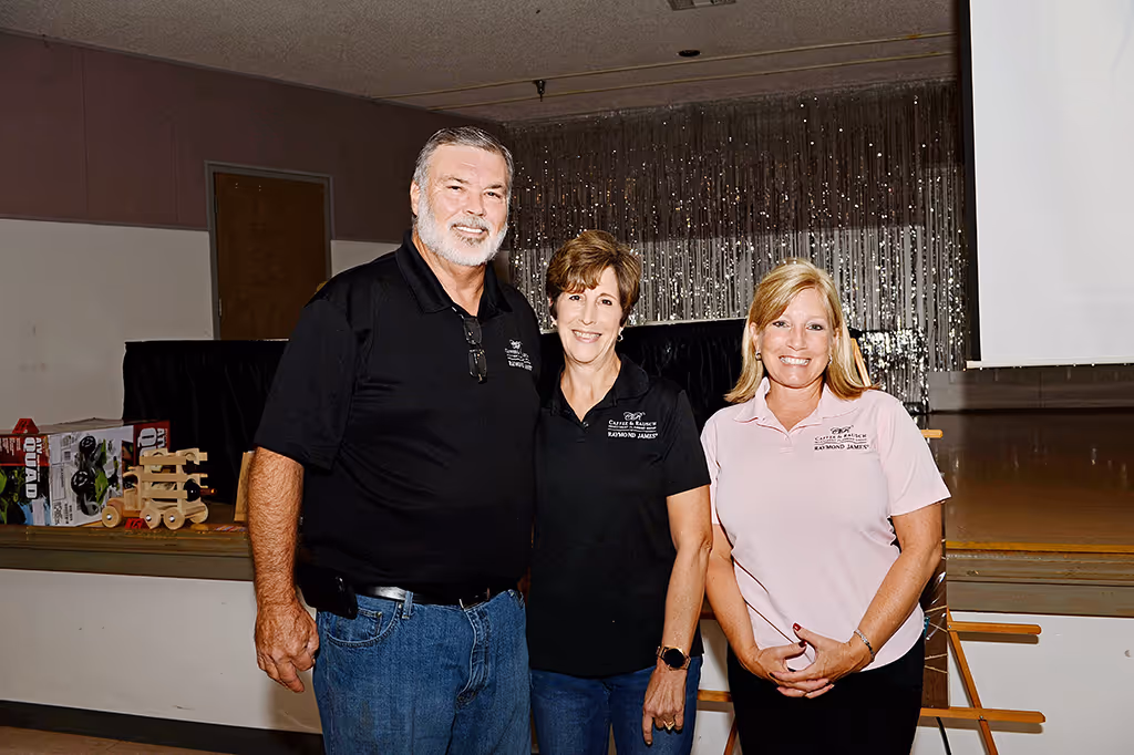 Don Rausch, Marie Rausch and Carolyn Caffee of Caffee and Rausch
