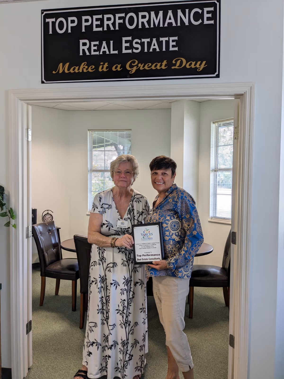 Debbie Rector, owner/broker of Top Performance Real Estate Consultants is pictured with Kathleen Cossey of Voices for Children.