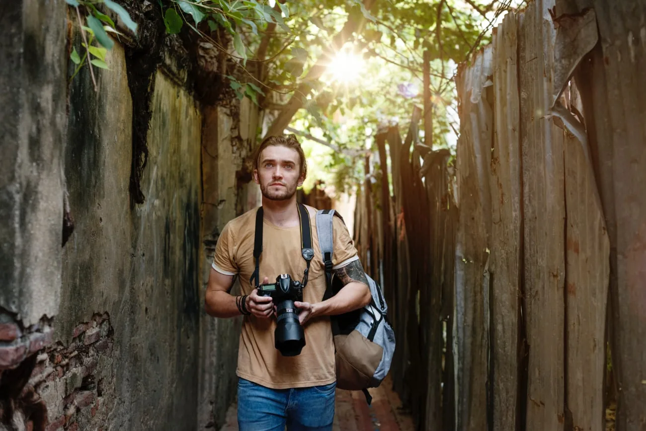White photographer walks