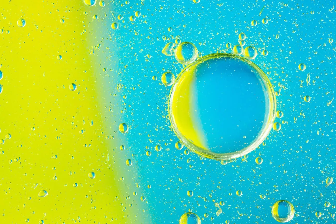 Yellow and blue oil droplets in an abstract color image
