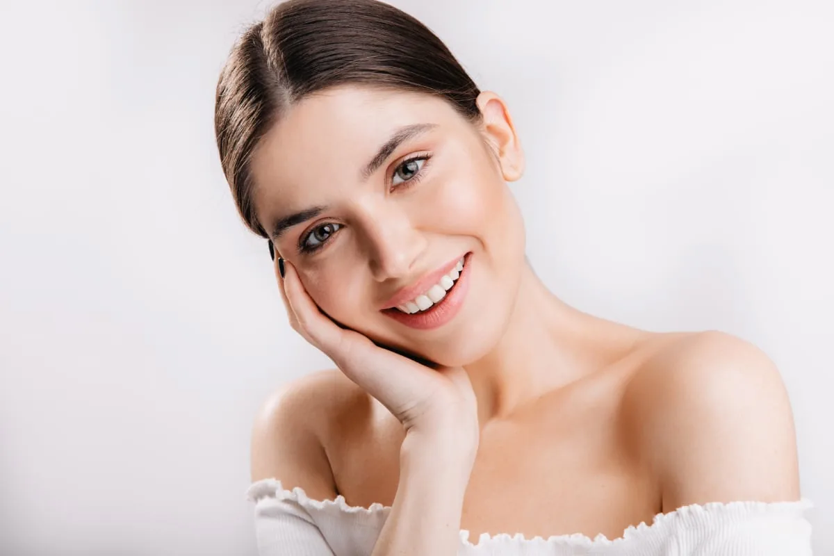 Smiling woman portrait in soft light
