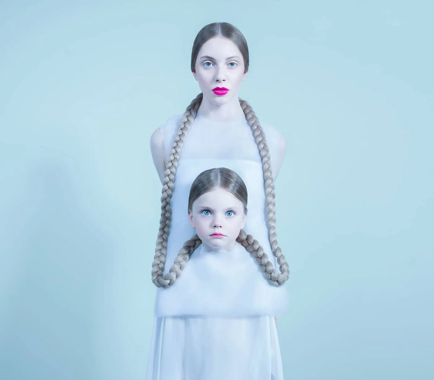 photo: © Bara Prasilova, mother and daughter linked by their braided hair