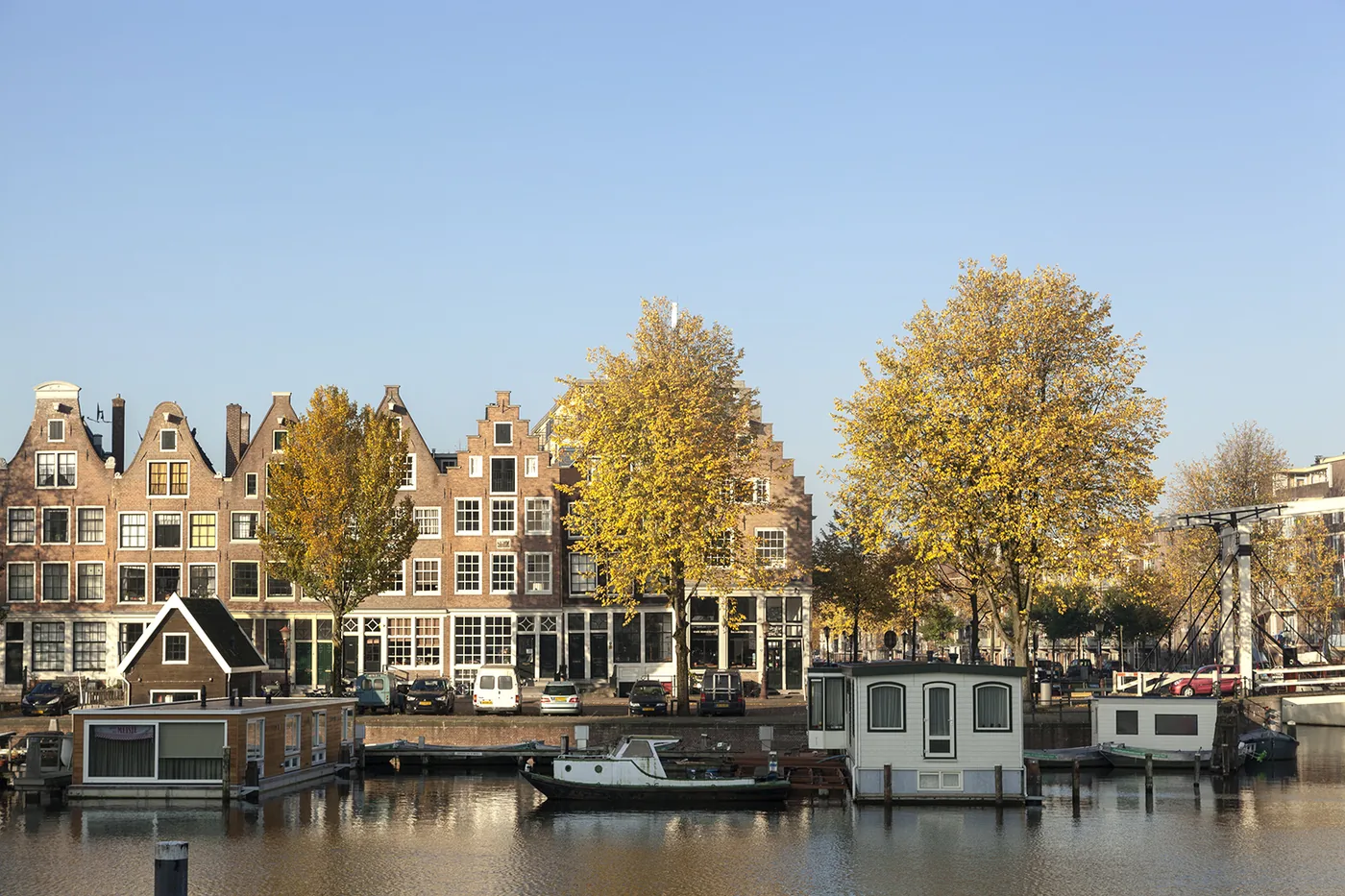 Amsterdam canal with houseboats, photographed by Ewout Huibers