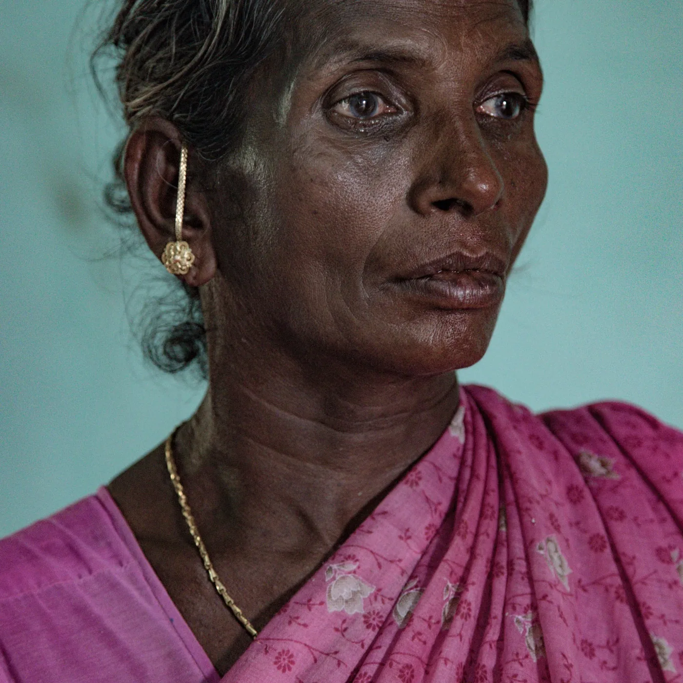 Photo by Federico Borella: portrait of an Indian woman with tears in her eyes