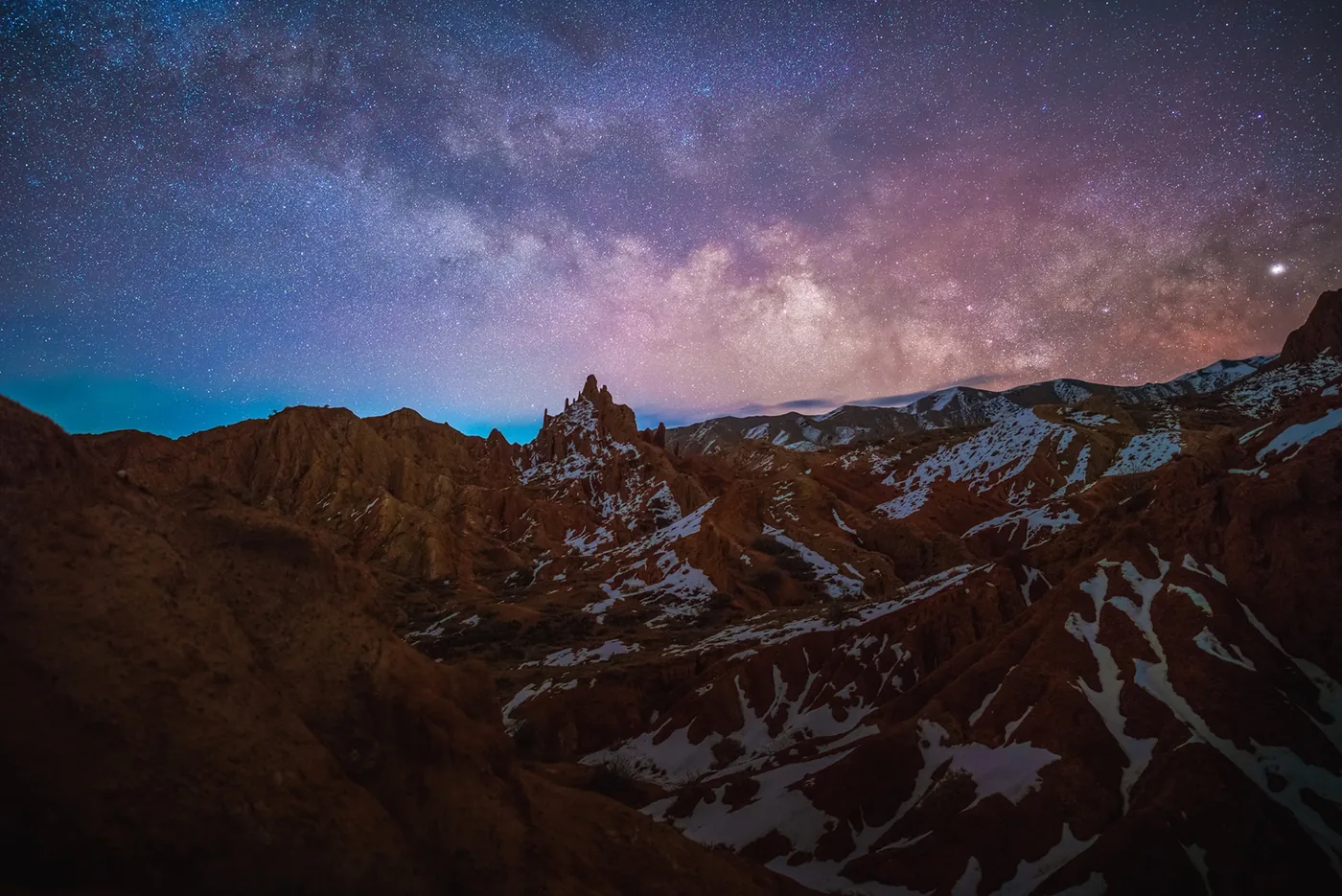 photo of the Milky Way above mountains at night