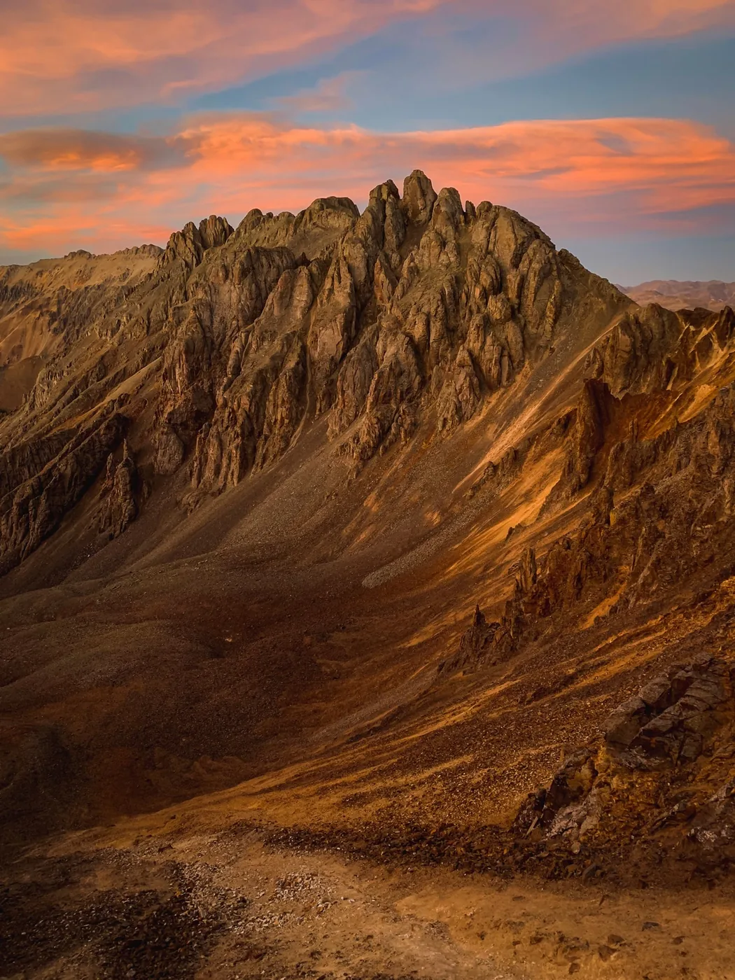 Ancient mountain range in orange-brown tones