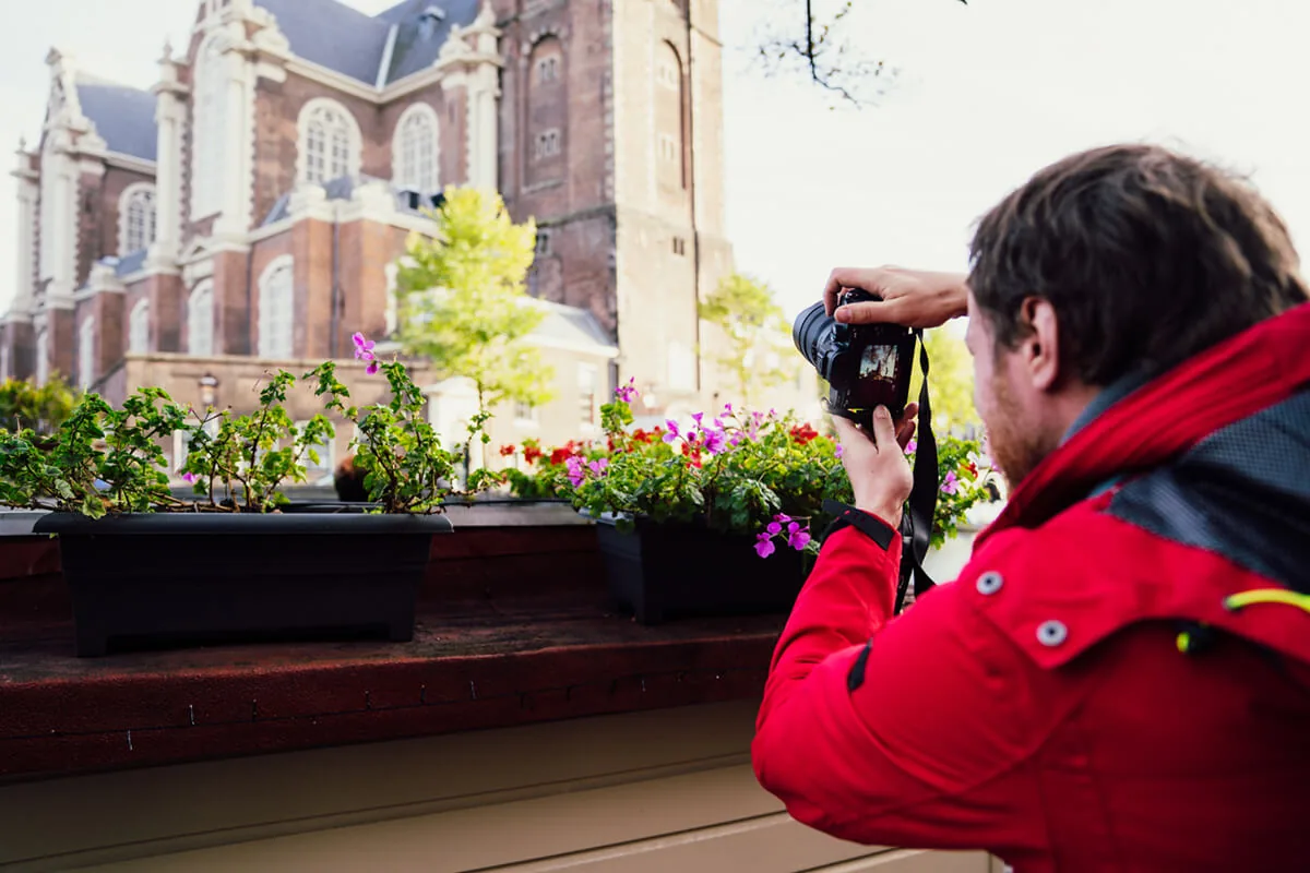 foto van fotograaf Albert Dros aan het fotograferen