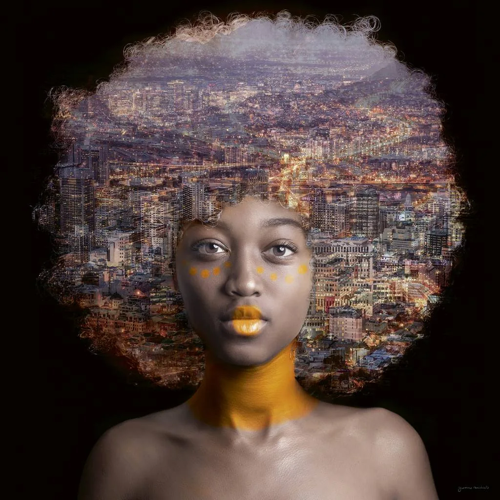 Double-exposed portrait of a woman with a city landscape