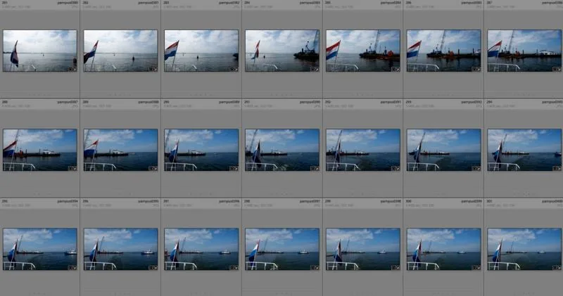 foto van foto's in Lightroom geladen van Nederlandse vlag op boot in water