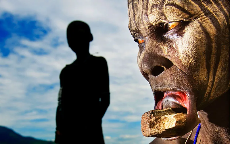 Photo by Pim Ras of a Mursi woman in Ethiopia with a lip plate in her lower lip
