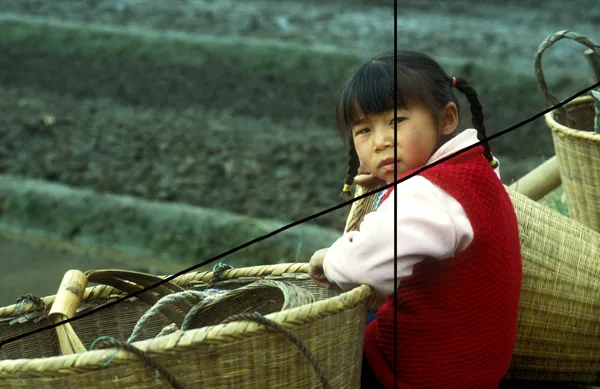 Chinese girl in a field: an ascending diagonal and a golden-ratio line.
