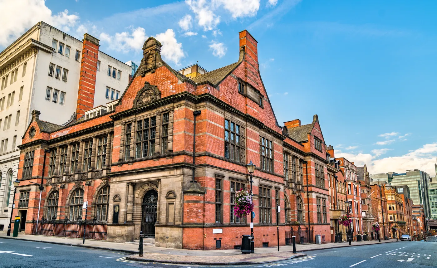 Historic red-brick building on a street corner in Birmingham