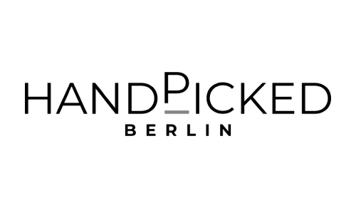 Handpicked berlin logo with a silhouette of Berlin TV Tower with layered black outline shapes behind.