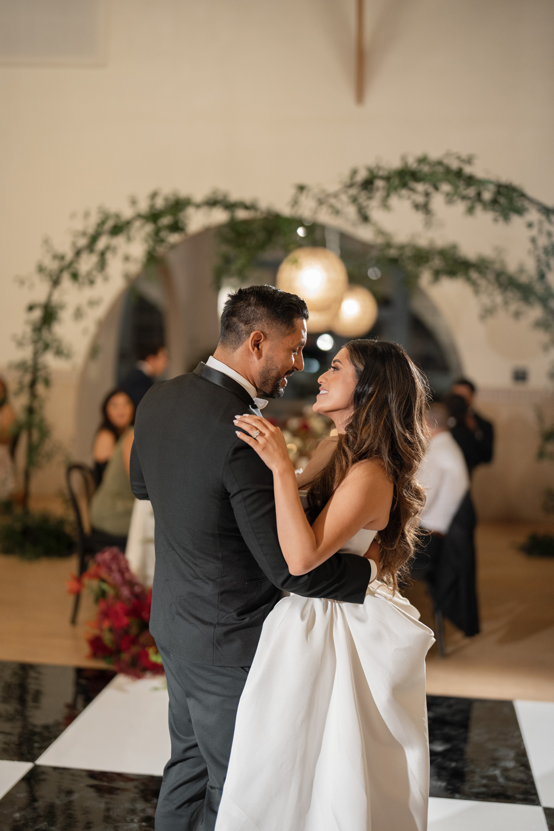 Bride and groom share their first dance inside the best Orange County wedding veune.