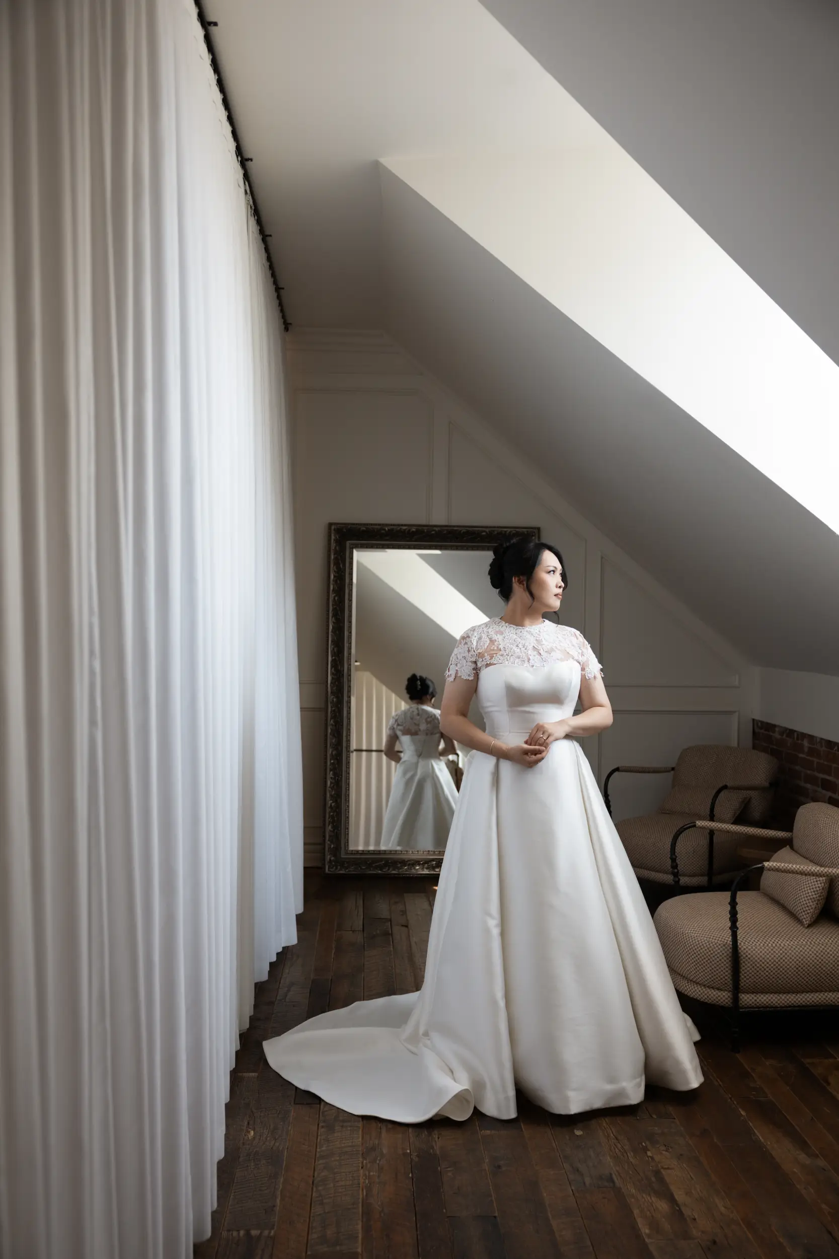 Bride poses for bridal portrait in the Estate's Bridal Suite.