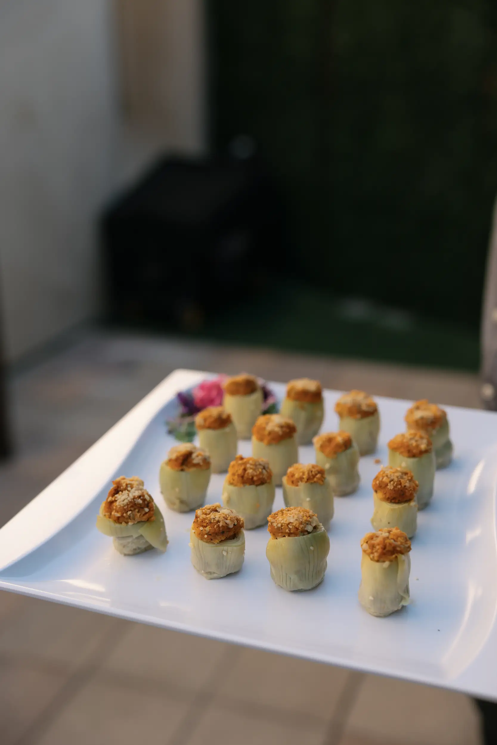 Lemon parmesan artichoke heart cocktail hour appetizer.