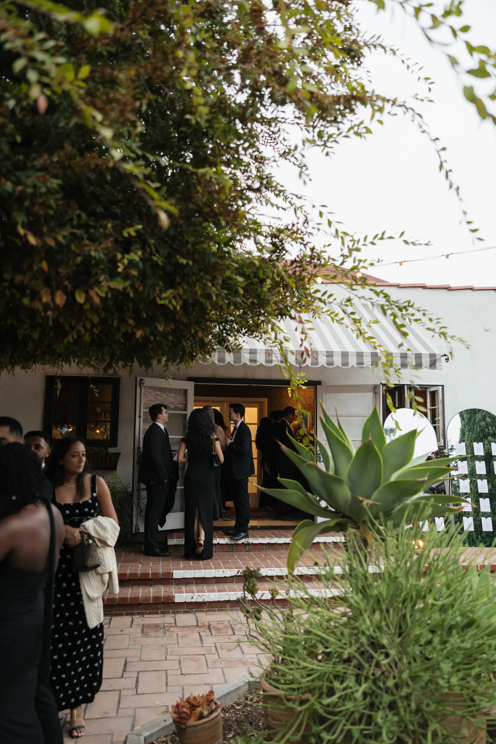 Guests mix and mingle on the Patio of the Stars for cocktail hour.