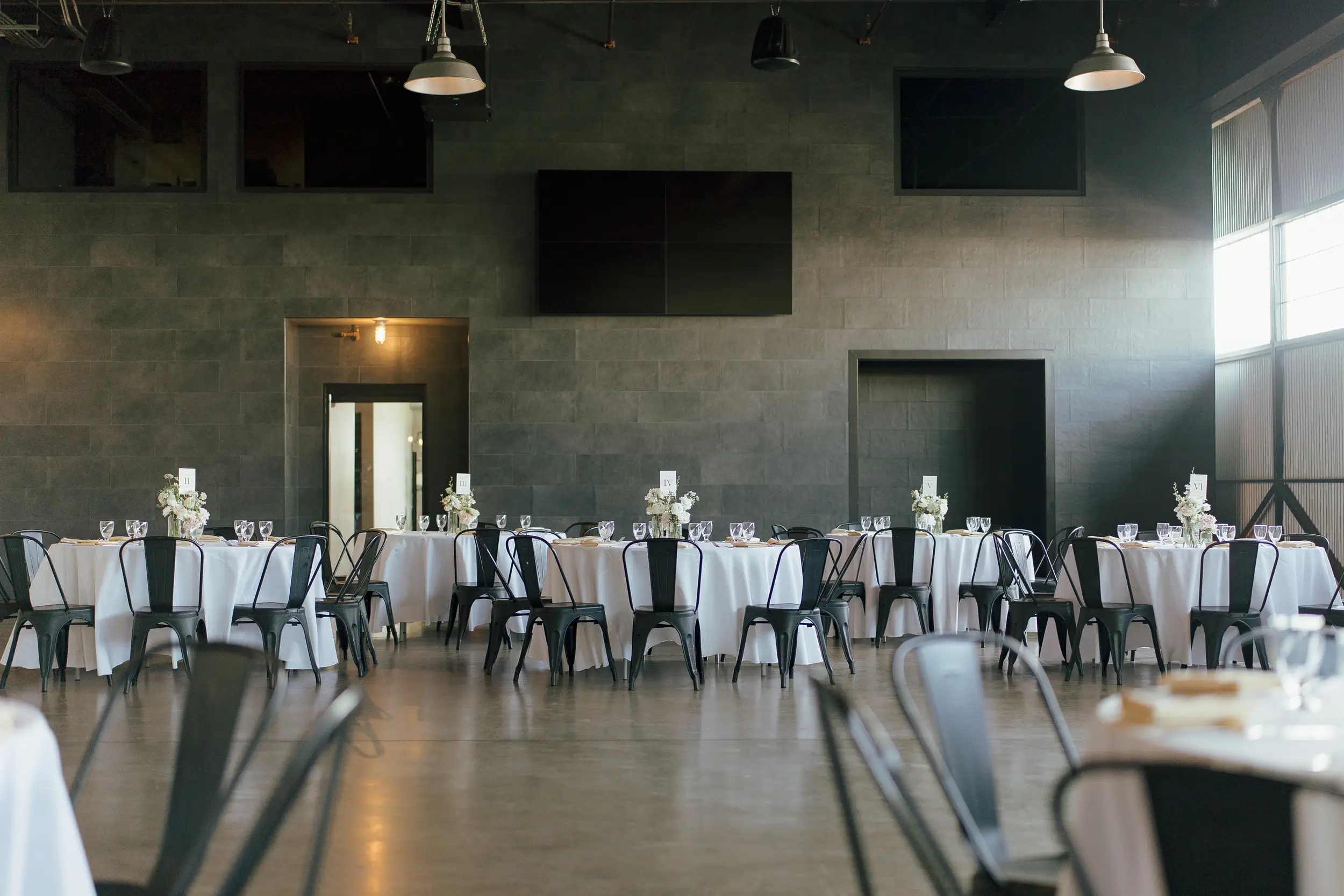 Reception tables are spread across the inside of the Hangar.
