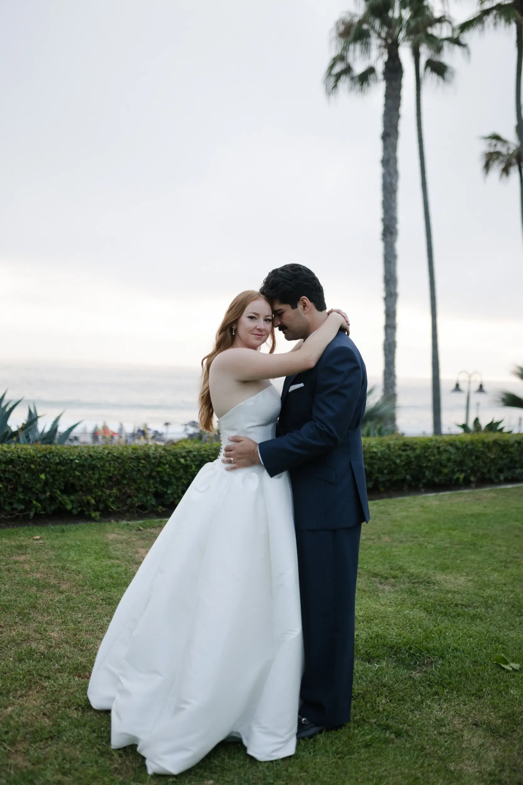Bride and groom seaside romantics.