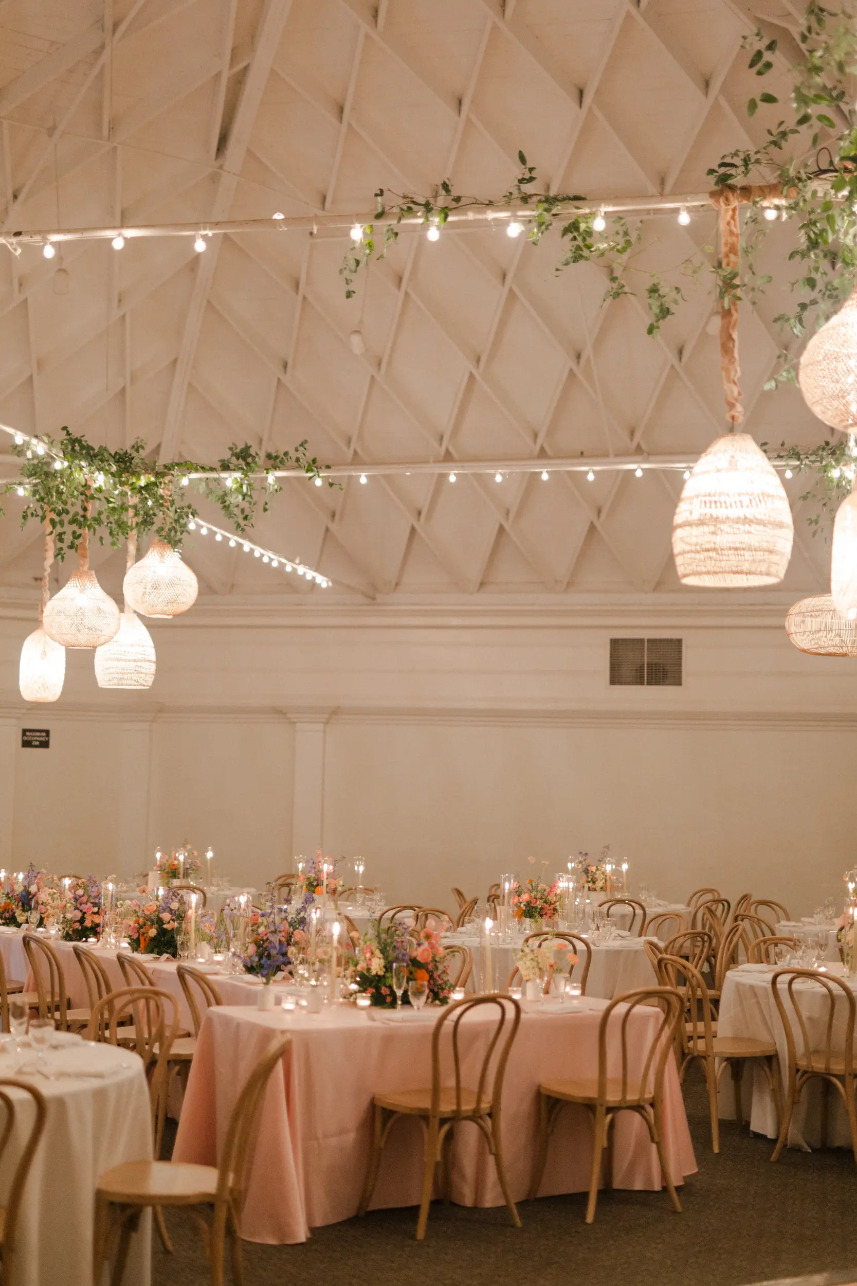 Garden-inspired wedding reception inside the Grand Ballroom at Casino San Clemente.