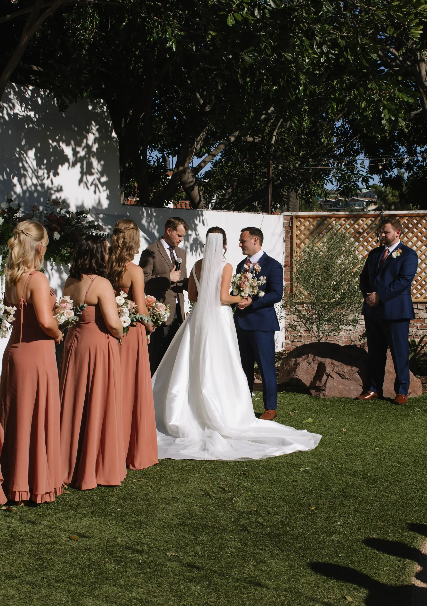 Bride and groom recite vows in the Rock Garden at the Casino San Clemente.