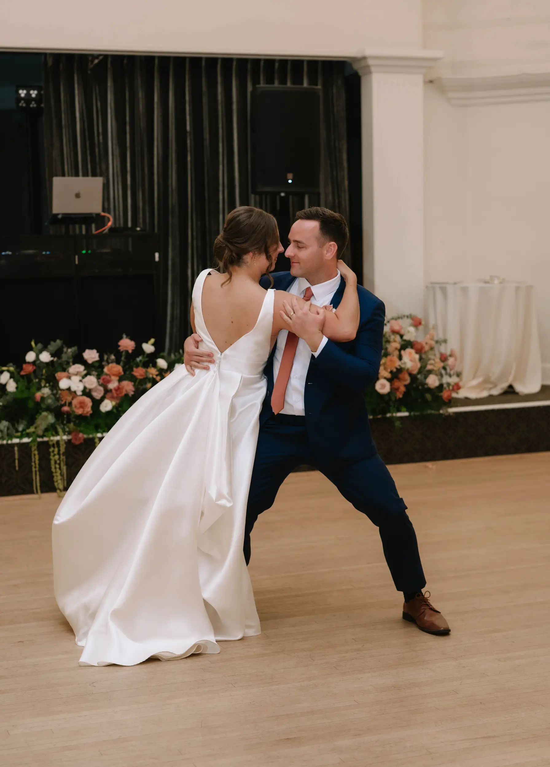 Bride and groom share their first dance.