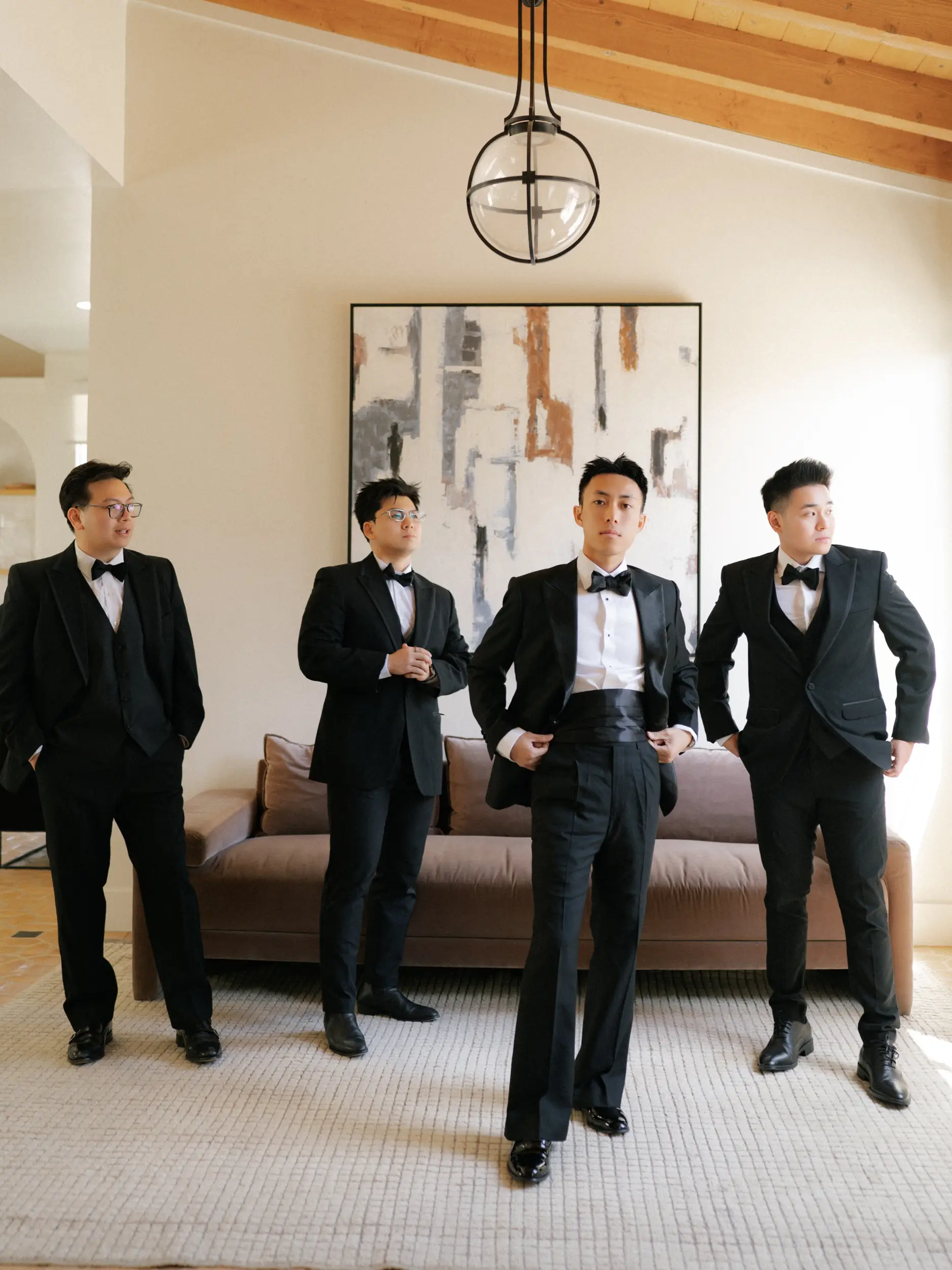 Groom with groomsmen in the groom suite.