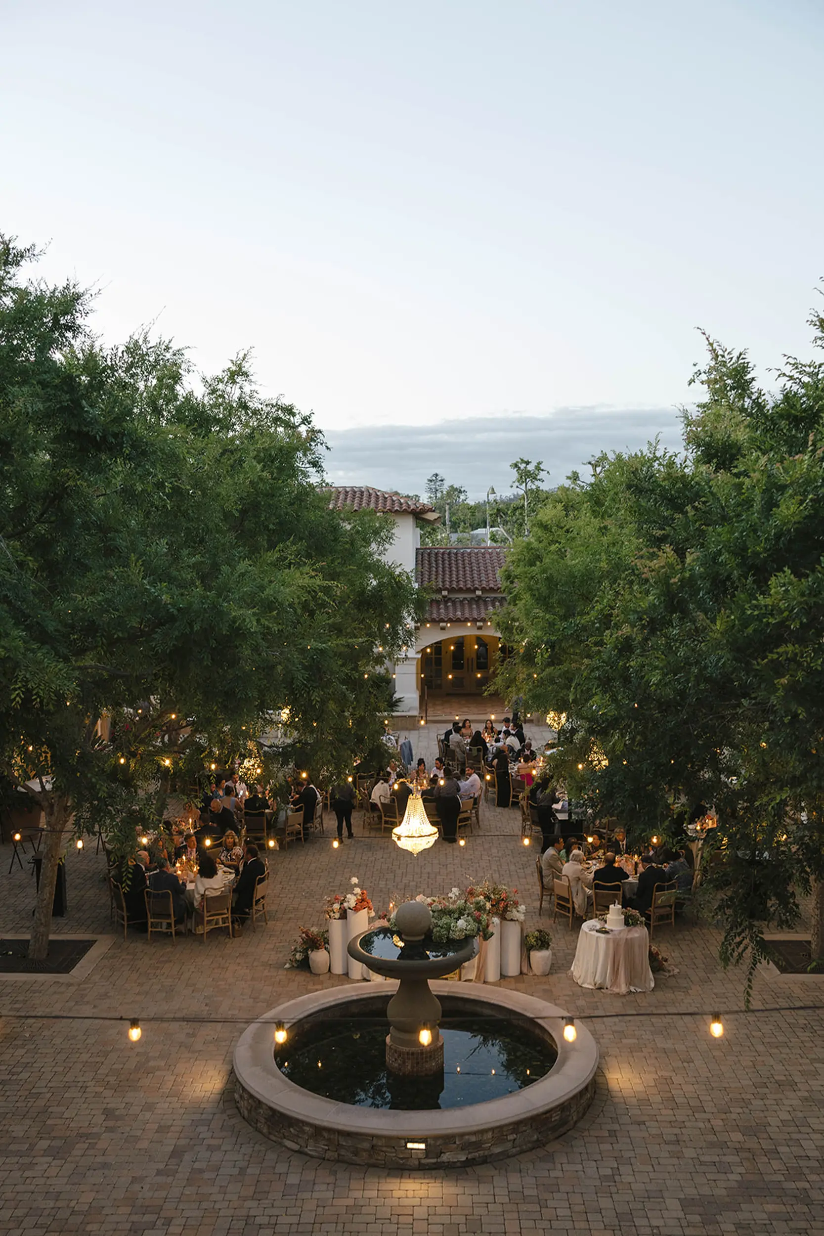 Romantic outdoor candlelit wedreception at Serra Plaza in Southern California.