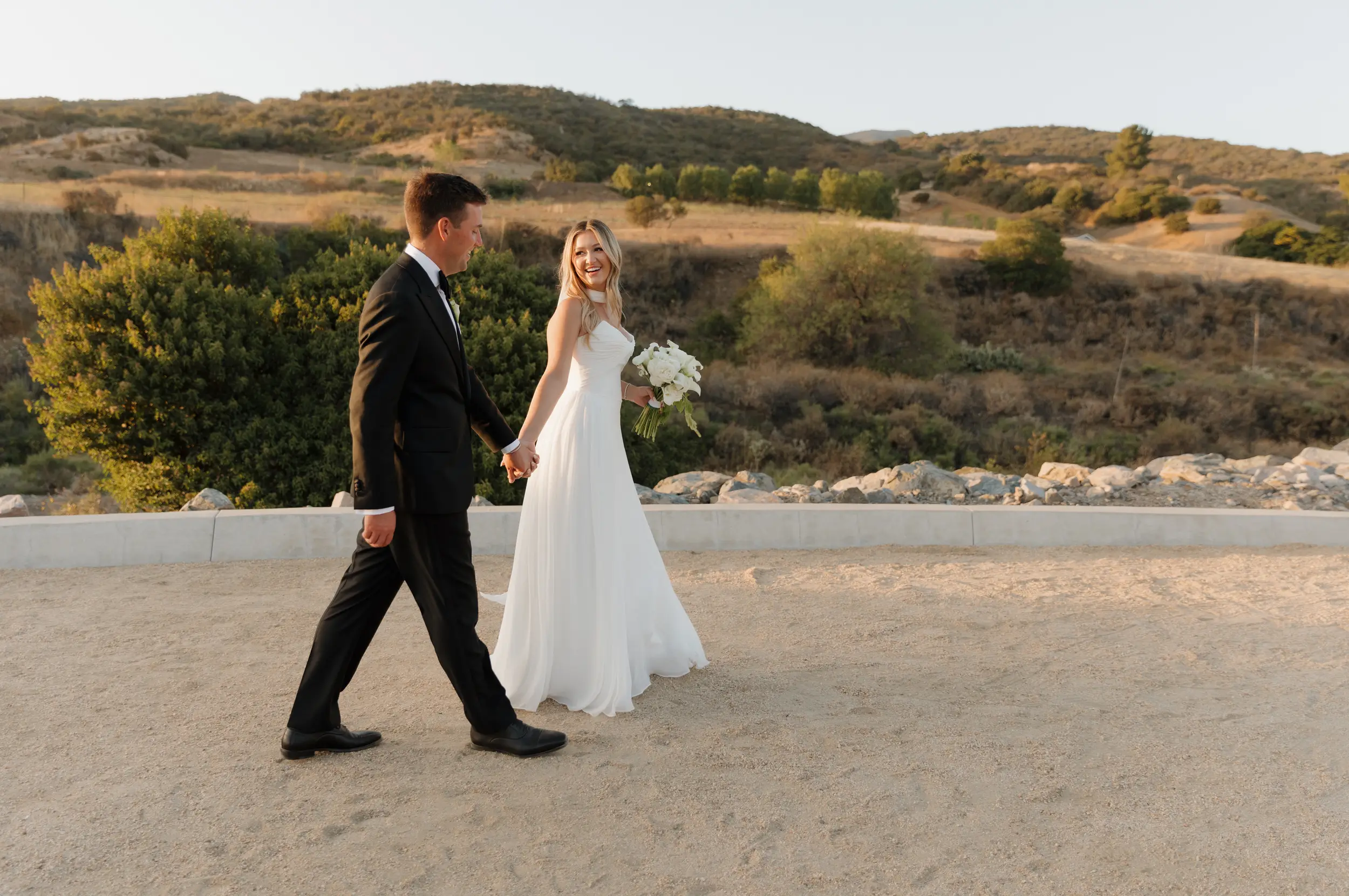 Bride and groom golden hour romantics.